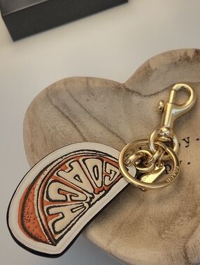 NWOT Coach Orange Slice Keychain